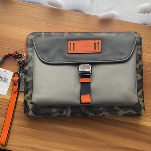 Coach Wristlet with camouflage and orange details